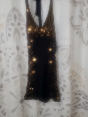 Sparkling Black Halter Mini Dress with Gold Accent Detailing